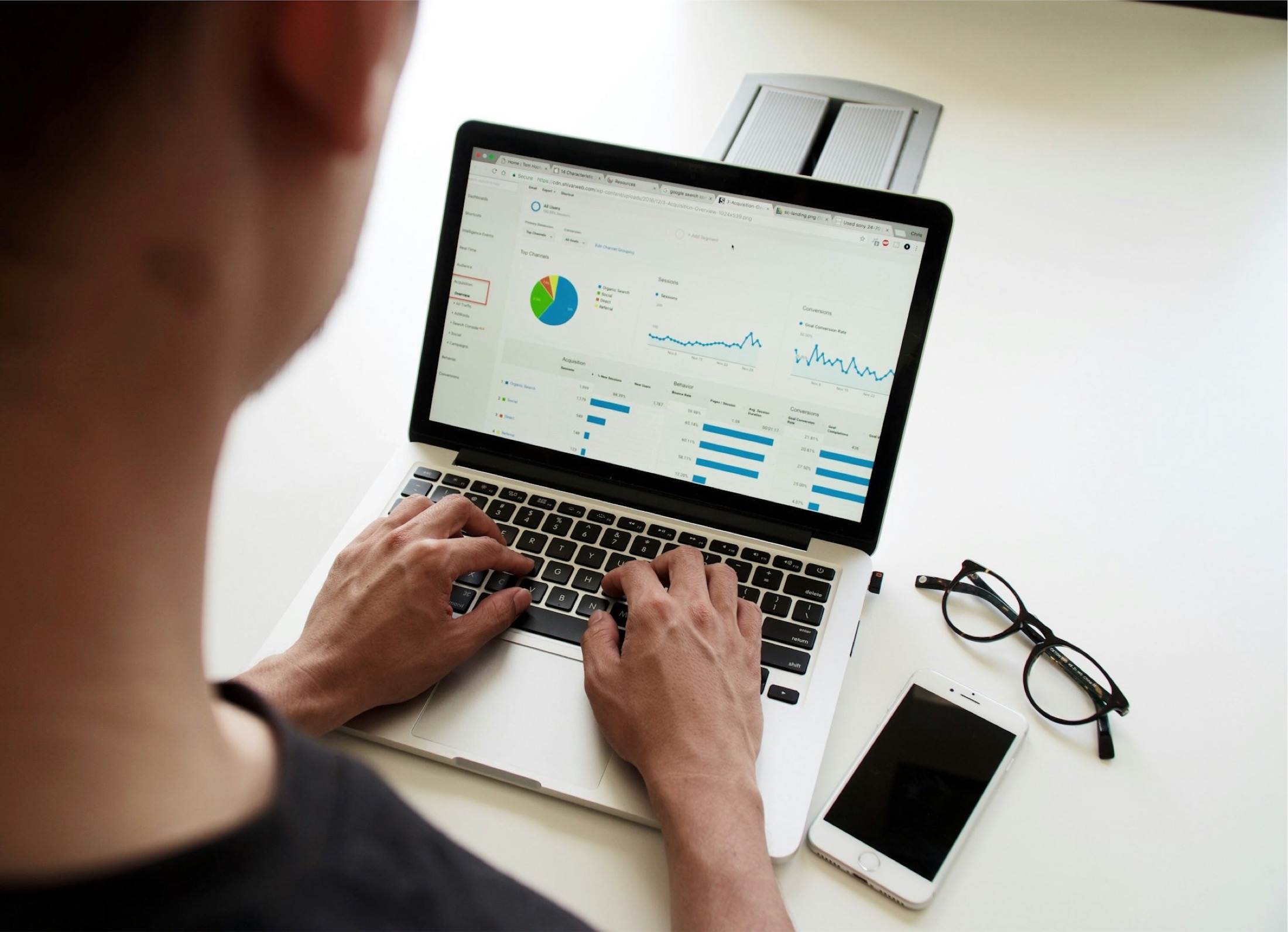 Laptop on a desk showing campaign analytics