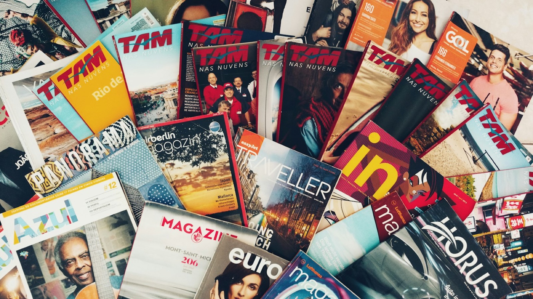 Magazines spread across a table