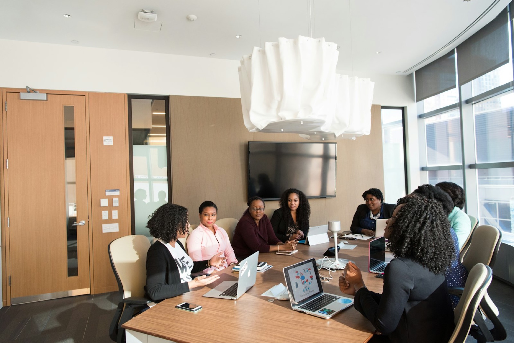 Planning team meeting around a conference table